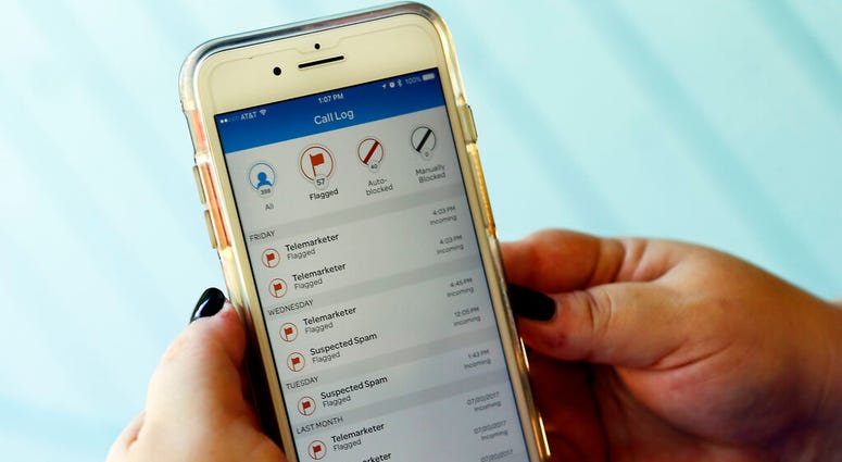 shows a call log displayed via an AT&T app on a cellphone in Orlando, Fla. AP DO NOT USE