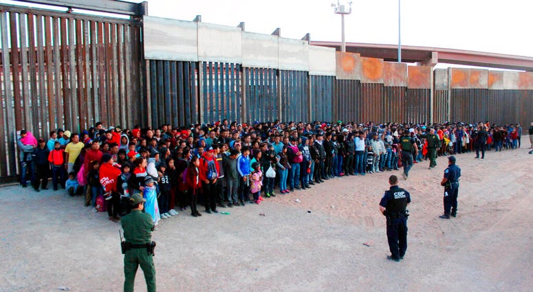 May 29, 2019 file photo released by U.S. Customs and Border Protection (CBP) shows some of 1,036 migrants who crossed the U.S.-Mexico border in El Paso, Texas May 29, 2019 file photo released by U.S. Customs and Border Protection (CBP) shows some of 1,036 migrants who crossed the U.S.-Mexico border in El Paso, Texas