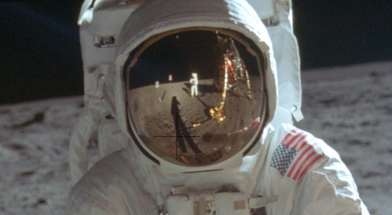 Neil Armstrong reflected in the helmet visor of Buzz Aldrin on the surface of the moon. Neil Armstrong reflected in the helmet visor of Buzz Aldrin on the surface of the moon.