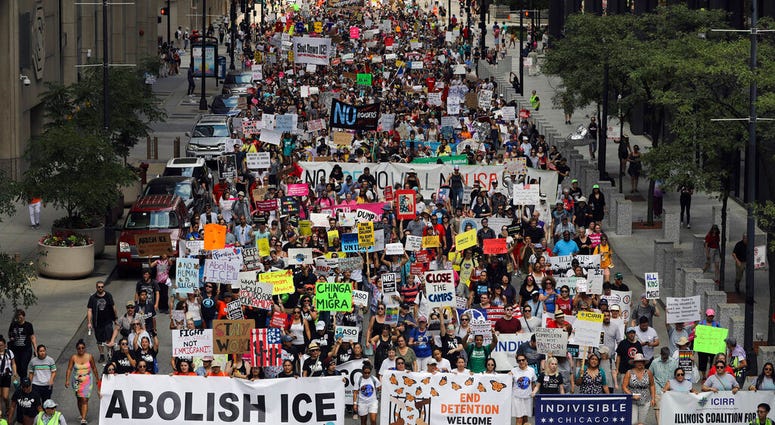 Thousands of people, including immigrants and their supporters, rally against President Trump's immigration policies as they march from Daley Plaza to the Chicago field office of Immigration and Customs Enforcement, Saturday, July 13, 2019, in Chicago. Thousands of people, including immigrants and their supporters, rally against President Trump's immigration policies as they march from Daley Plaza to the Chicago field office of Immigration and Customs Enforcement, Saturday, July 13, 2019, in Chicago.