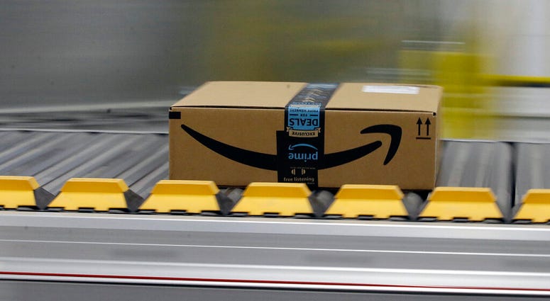 file photo a box for an Amazon prime customer moves through the new Amazon Fulfillment Center in Sacramento, Calif AP DO NOT USE