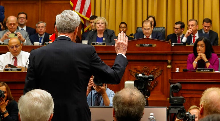 Former special counsel Robert Mueller is sworn in by House Judiciary Committee Chairman Jerrold Nadler, D-N.Y., to testify before the House Judiciary Committee hearing on his report on Russian election interference, on Capitol Hill, Wednesday, July 24, 20