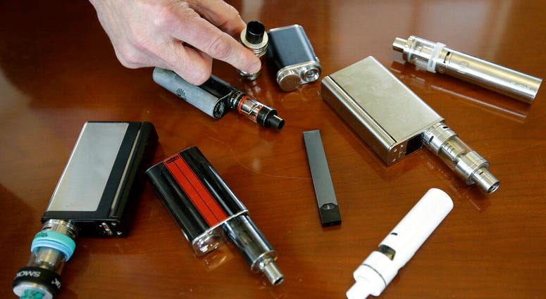 Marshfield High School Principal Robert Keuther displays vaping devices Marshfield High School Principal Robert Keuther displays vaping devices