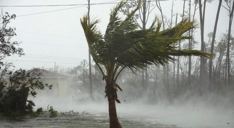 A road is flooded during the passing of Hurricane Dorian in Freeport, Grand Bahama, Bahamas, A road is flooded during the passing of Hurricane Dorian in Freeport, Grand Bahama, Bahamas,
