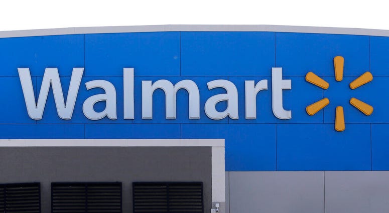 In this Sept. 3, 2019 file photo, a Walmart logo is displayed outside of a Walmart store, in Walpole, Mass. AP DO NOT USE