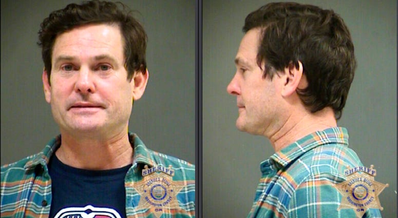 his image provided by the Washington County Sheriff's Office shows booking photos of actor Henry Thomas.