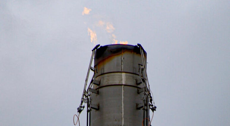 In this Oct. 17, 2019, photo, a flame burns from a stack at the MarkWest Bluestone Gas Processing Plant in Evans City, Pa. AP DO NOT USE