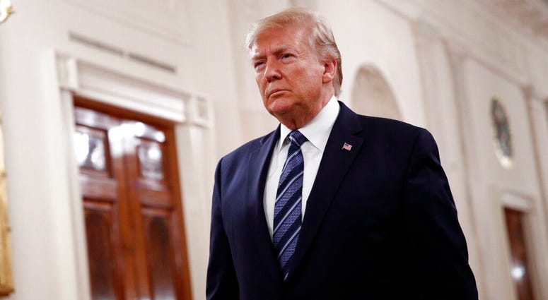 President Donald Trump arrives to speak at a ceremony to present the Presidential Citizens Medal posthumously to Rick Rescorla in the East Room of the White House, Thursday, Nov. 7, 2019, in Washington.