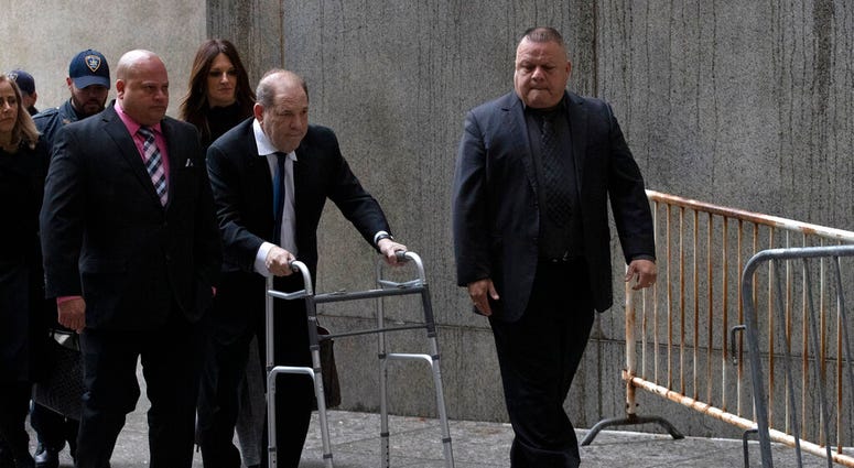 Harvey Weinstein, center, arrives for a court hearing, Wednesday, Dec. 11, 2019 in New York. Harvey Weinstein, center, arrives for a court hearing, Wednesday, Dec. 11, 2019 in New York.