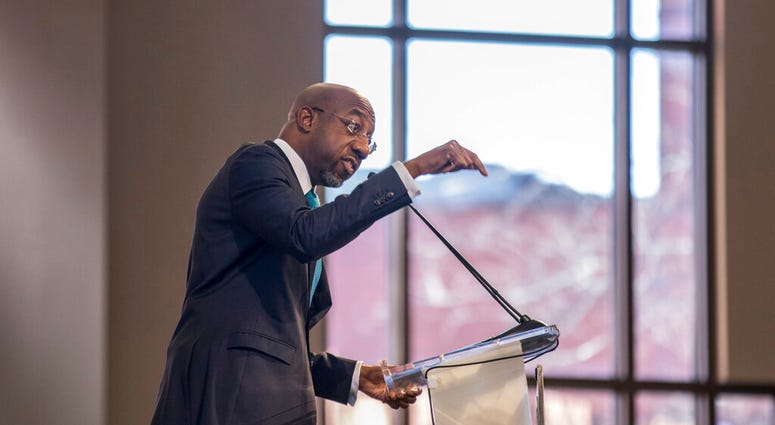 The Rev. Raphael G. Warnock speaks during the Martin Luther King, Jr. annual commemorative service at Ebenezer Baptist Church in Atlanta on Monday, Jan. 20, 2020.
