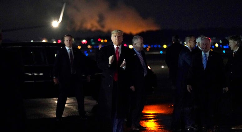 President Donald Trump arrives at Manchester-Boston Regional Airport for a campaign rally, Monday, Feb. 10, 2020, in Manchester, N.H.