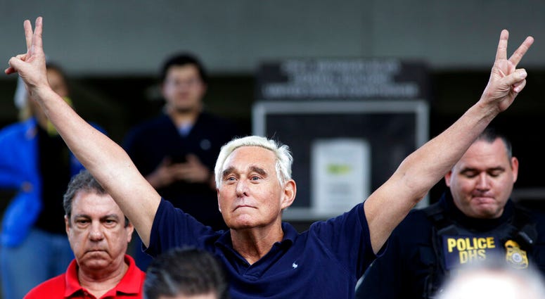 file photo, former campaign adviser for President Donald Trump, Roger Stone walks out of the federal courthouse following a hearing, in Fort Lauderdale, Fla.