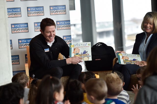 PNC Bank Chip Ganassi Racing's Scott Dixon Reads To Children At Indianapolis Motor Speedway As Part Of PNC's Grow Up Great Program PNC Bank Chip Ganassi Racing's Scott Dixon Reads To Children At Indianapolis Motor Speedway As Part Of PNC's Grow Up Great Program