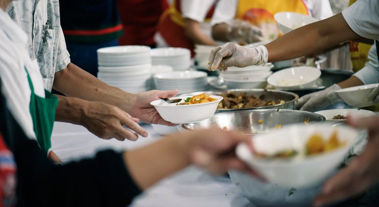 Volunteers handing out food