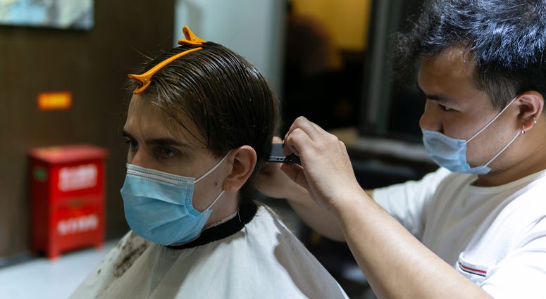 Cutting hair with masks on
