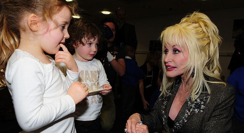 Dolly Parton talking with children