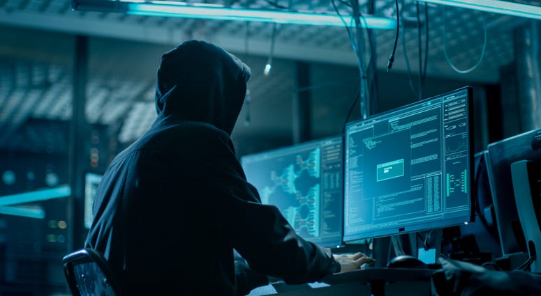 Hacker Breaking into Corporate Data Servers from His Underground Hideout Hacker Breaking into Corporate Data Servers from His Underground Hideout
