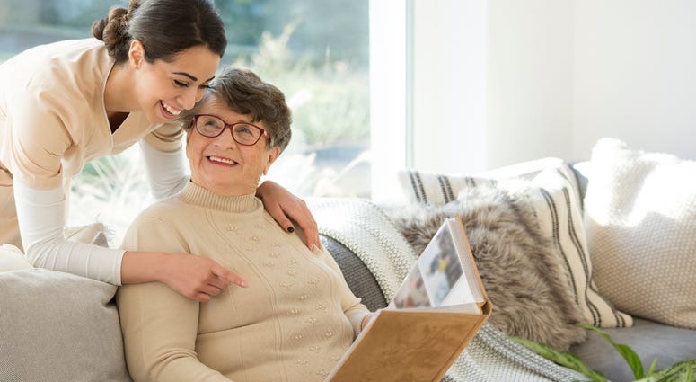 Grandmother with tender caregiver Grandmother with tender caregiver