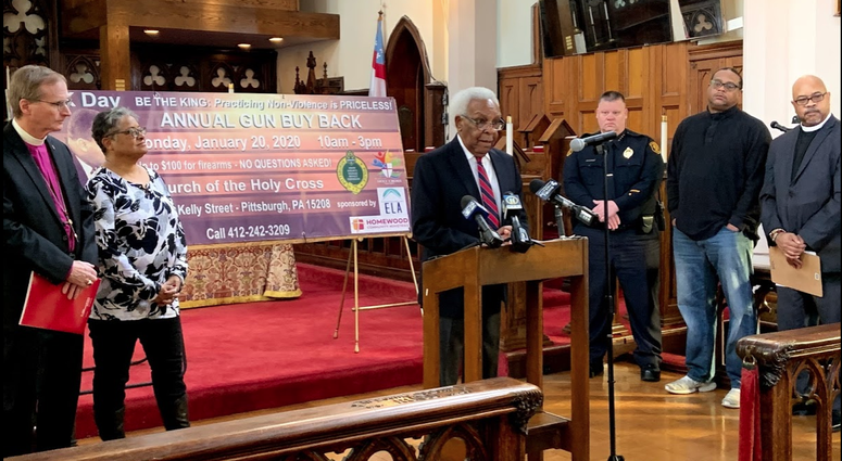 The murders of a man and woman last November just feet from the door to Church of the Holy Cross is prompting the Homewood congregation to find a way to take guns off the streets.