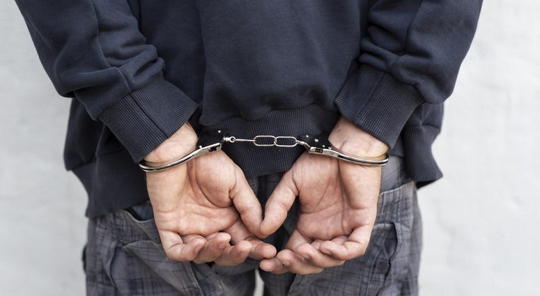 Man in Handcuffs Man in Handcuffs