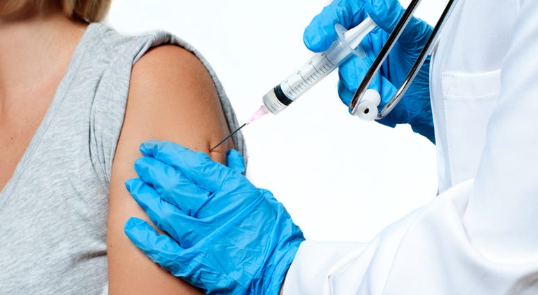 file photo: receiving a flu shot