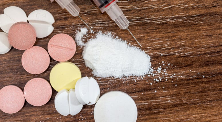 Drug syringe and cooked heroin