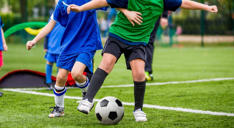 Kids playing soccer