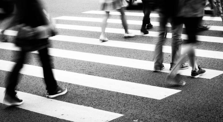 People Walking Through Intersection People Walking Through Intersection