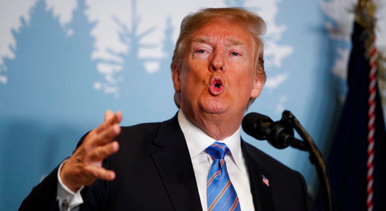 President Donald Trump speaks during a news conference at the G-7 summit, Saturday, June 9, 2018, in La Malbaie, Quebec, Canada. DO NOT USE
