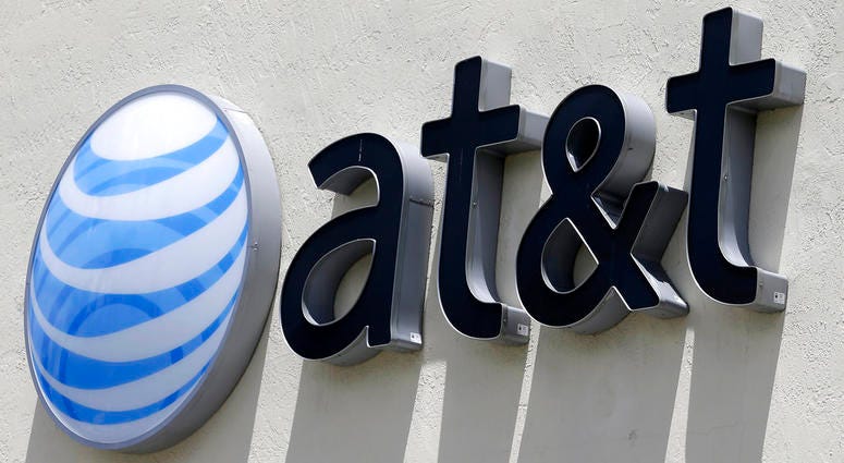 file photo shows an AT&T logo at a store in Hialeah, Fla. AT&T is joining Verizon in pledging to end sales of phone location data to brokers. The practice has drawn criticism from privacy advocates who say users often don't know their data has been sold DO NOT USE