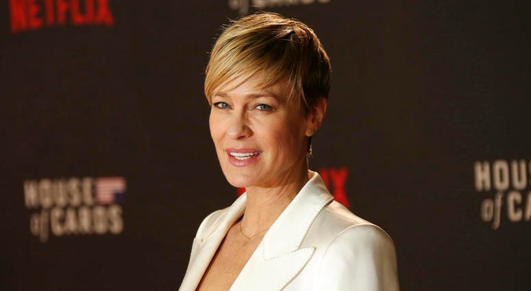 Actress Robin Wright poses for photographers upon arrival at the House Of Cards season 3 World Premiere at the Empire Cinema in central London. DO NOT USE