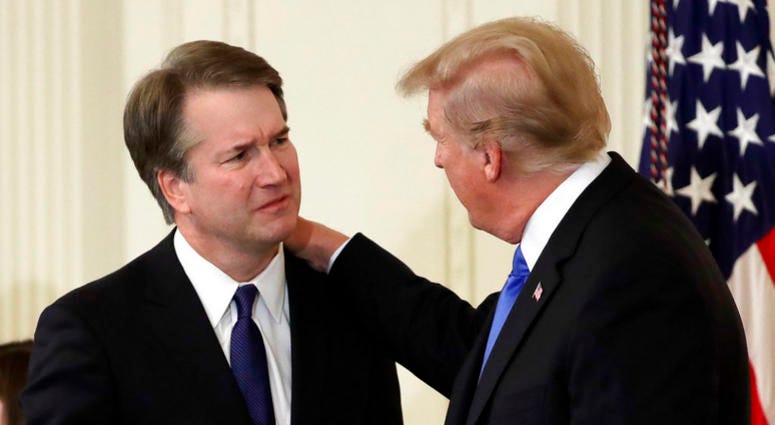 President Donald Trump greets Judge Brett Kavanaugh his Supreme Court nominee, in the East Room of the White House, Monday, July 9, 2018, in Washington DO NOT USE