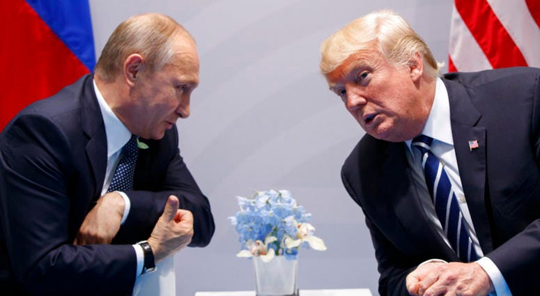 In this July 7, 2017 file photo U.S. President Donald Trump meets with Russian President Vladimir Putin at the G-20 Summit in Hamburg. DO NOT USE