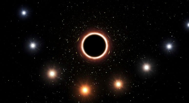 This artist's impression provided by the European Southern Observatory in July 2018 shows the path of the star S2 as it passes close to the supermassive black hole at the center of the Milky Way galaxy. DO NOT USE