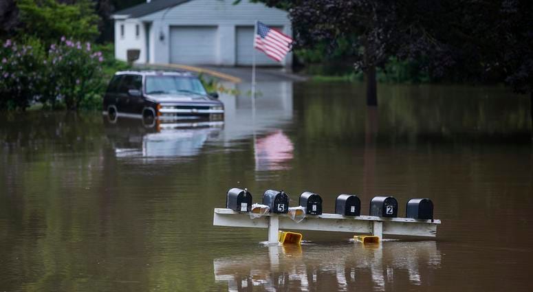 Water rises on Duke Street in Hummelstown, Pa. Water rises on Duke Street in Hummelstown, Pa.