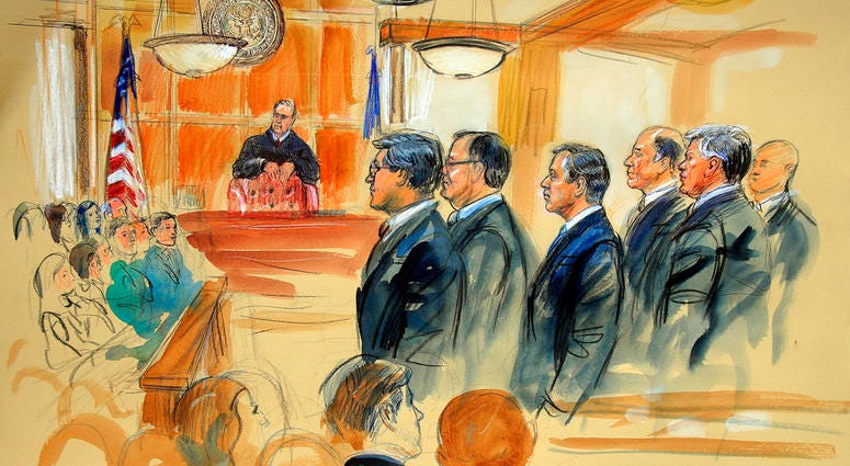 This courtroom sketch depicts Paul Manafort, fourth from right, standing with his lawyers in front of U.S. district Judge T.S. Ellis III, center rear, and the selected jury, seated left, during the jury selection of his trial. DO NOT USE