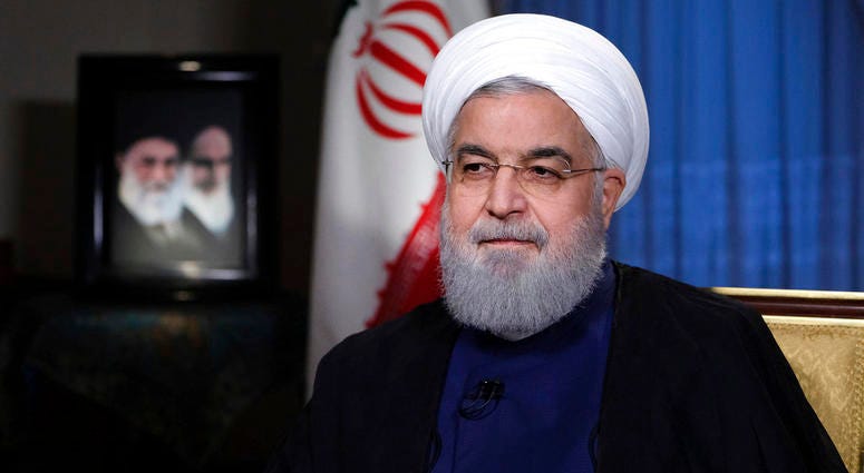 President Hassan Rouhani addresses the nation in a televised speech in Tehran, Iran, Monday, Aug. 6, 2018.