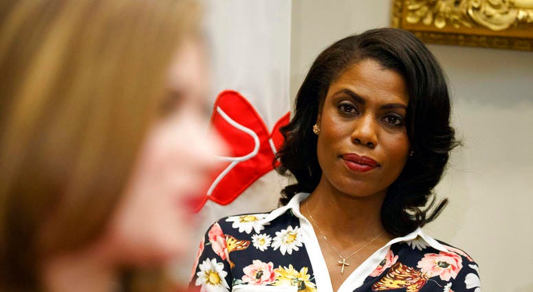 Omarosa Manigault-Newman, then an aide to President Donald Trump, watches during a meeting with parents and teachers in the Roosevelt Room of the White House in Washington. DO NOT USE