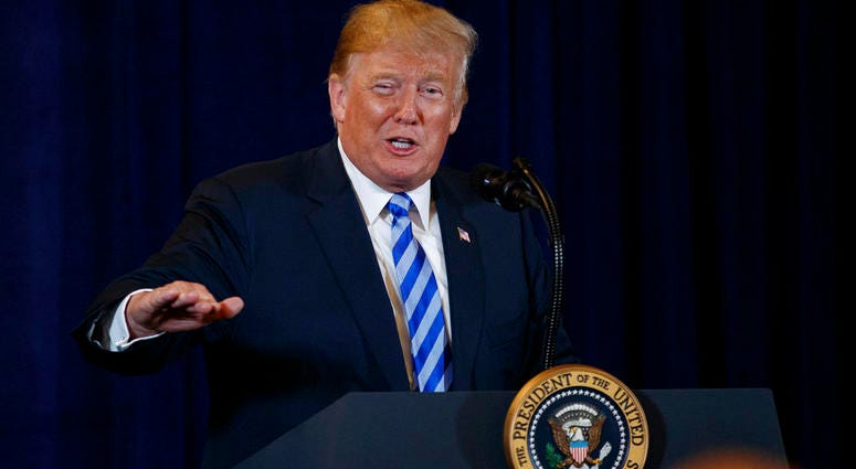 President Donald Trump speaks in Utica, N.Y., Monday, Aug. 13, 2018, at a joint fundraising committee reception in Utica, N.Y. DO NO NOT USE