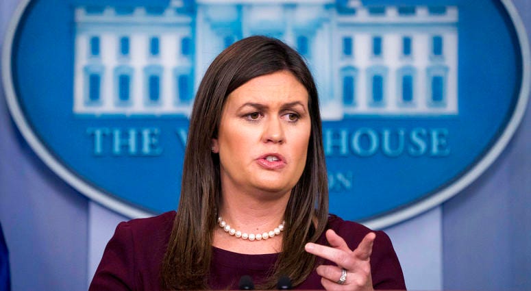 White House press secretary Sarah Huckabee Sanders speaks to the media during the daily press briefing at the White House, Tuesday, Aug. 14, 2018, in Washington. Sanders took questions about former White House staffer Omarosa Manigault Newmanand DO NOT USE