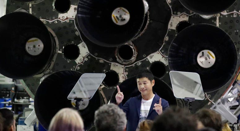 Japanese billionaire Yusaku Maezawa speaks after SpaceX founder and chief executive Elon Musk announced him as the first scheduled private passenger on a trip around the moon, Monday, Sept. 17, 2018, in Hawthorne, Calif. DO NOT USE