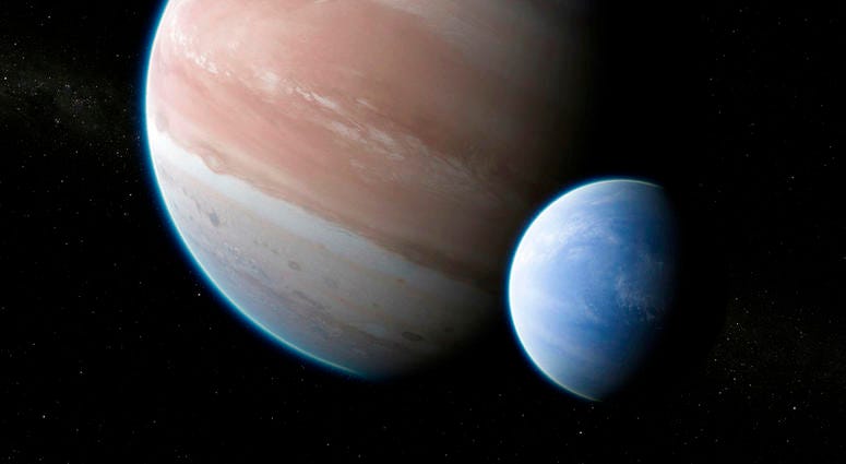 This illustration provided by Dan Durda shows the exoplanet Kepler-1625b with a hypothesized moon. DO NOT USE