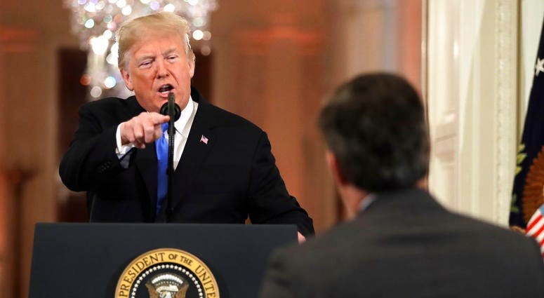 President Donald Trump points as he speaks during a news conference in the East Room of the White House, Wednesday, Nov. 7, 2018, in Washington. DO NOT USE