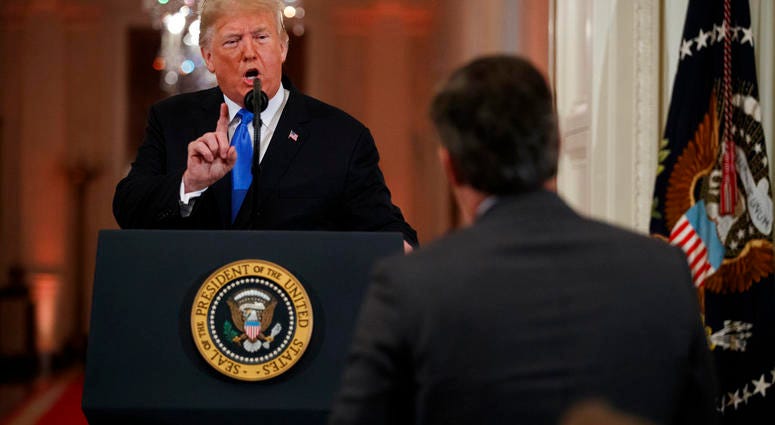 President Donald Trump speaks to CNN journalist Jim Acosta President Donald Trump speaks to CNN journalist Jim Acosta