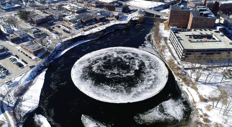 aerial image taken from a drone video and provided by the City of Westbrook, Maine, a naturally occurring ice disk forms on the Presumpscot River in Westbrook, Maine. AP DO NOT USE