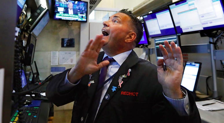 Trader Jonathan Muller works in his booth on the floor of the New York Stock Exchange, Monday, July 1, 2019. Stocks are rallying early Monday after the U.S. and China agreed to resume trade talks. Trader Jonathan Muller works in his booth on the floor of the New York Stock Exchange, Monday, July 1, 2019. Stocks are rallying early Monday after the U.S. and China agreed to resume trade talks.