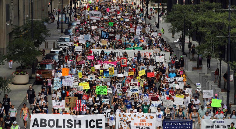 Thousands of people, including immigrants and their supporters, rally against President Trump's immigration policies as they march from Daley Plaza to the Chicago field office of Immigration and Customs Enforcement, Saturday, July 13, 2019, in Chicago. Thousands of people, including immigrants and their supporters, rally against President Trump's immigration policies as they march from Daley Plaza to the Chicago field office of Immigration and Customs Enforcement, Saturday, July 13, 2019, in Chicago.