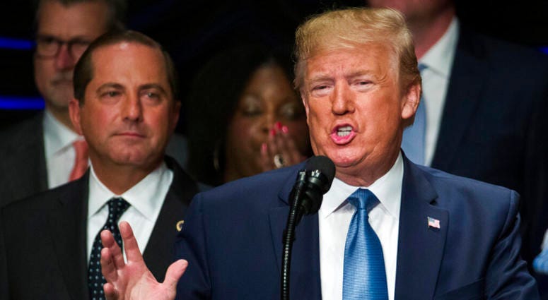 In this Wednesday, July 10, 2019, file photo, President Donald Trump speaks about kidney health, accompanied by Health and Human Services Secretary Alex Azar, left, in Washington. AP DO NOT USE