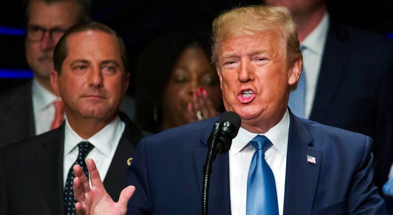 President Donald Trump speaks about kidney health, accompanied by Health and Human Services Secretary Alex Azar, left, in Washington President Donald Trump speaks about kidney health, accompanied by Health and Human Services Secretary Alex Azar, left, in Washington