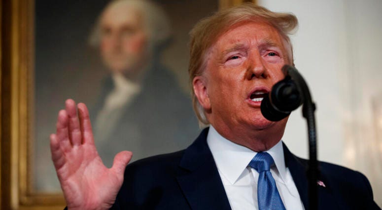 President Donald Trump speaks about the mass shootings in El Paso, Texas and Dayton, Ohio, in the Diplomatic Reception Room of the White House, Monday, Aug. 5, 2019, in Washington. AP DO NOT USE